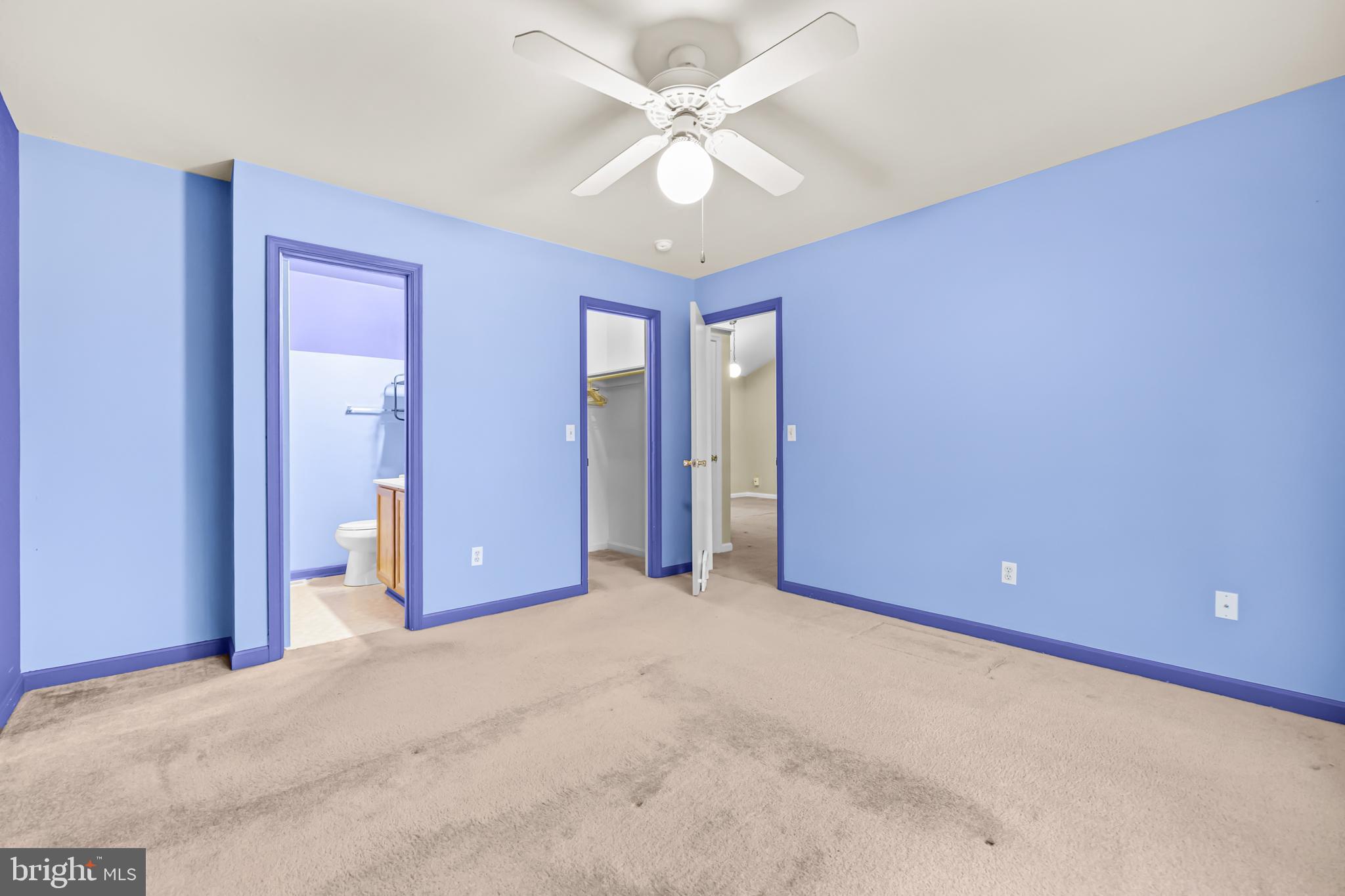 124 Saylers Creek Road Locust Grove, VA 22508 - Photo 26 of 55 a view of a livingroom with a chandelier fan and windows