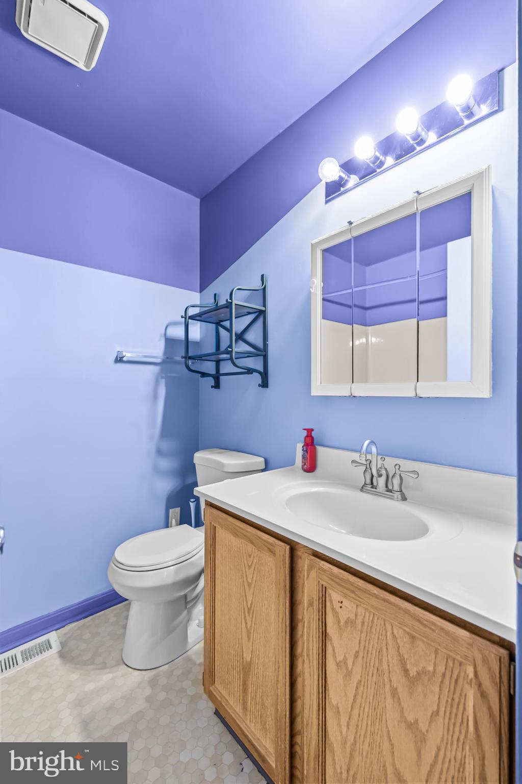 124 Saylers Creek Road Locust Grove, VA 22508 - Photo 29 of 55 a bathroom with a sink toilet vanity and granite