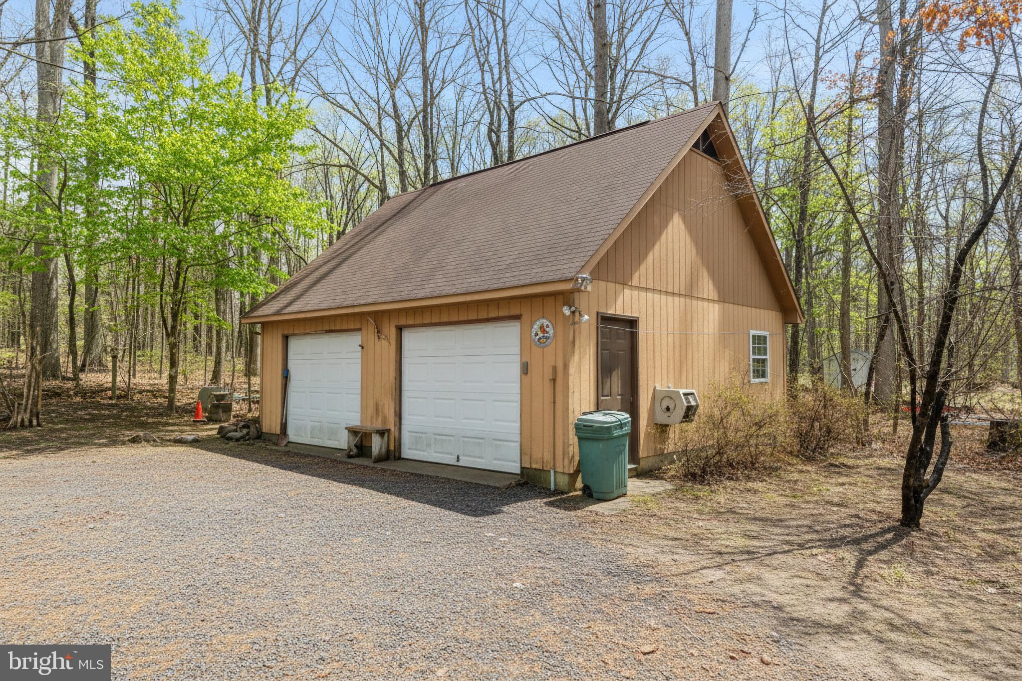 124 Saylers Creek Road Locust Grove, VA 22508 - Photo 30 of 55 a view of a house with a yard and garage
