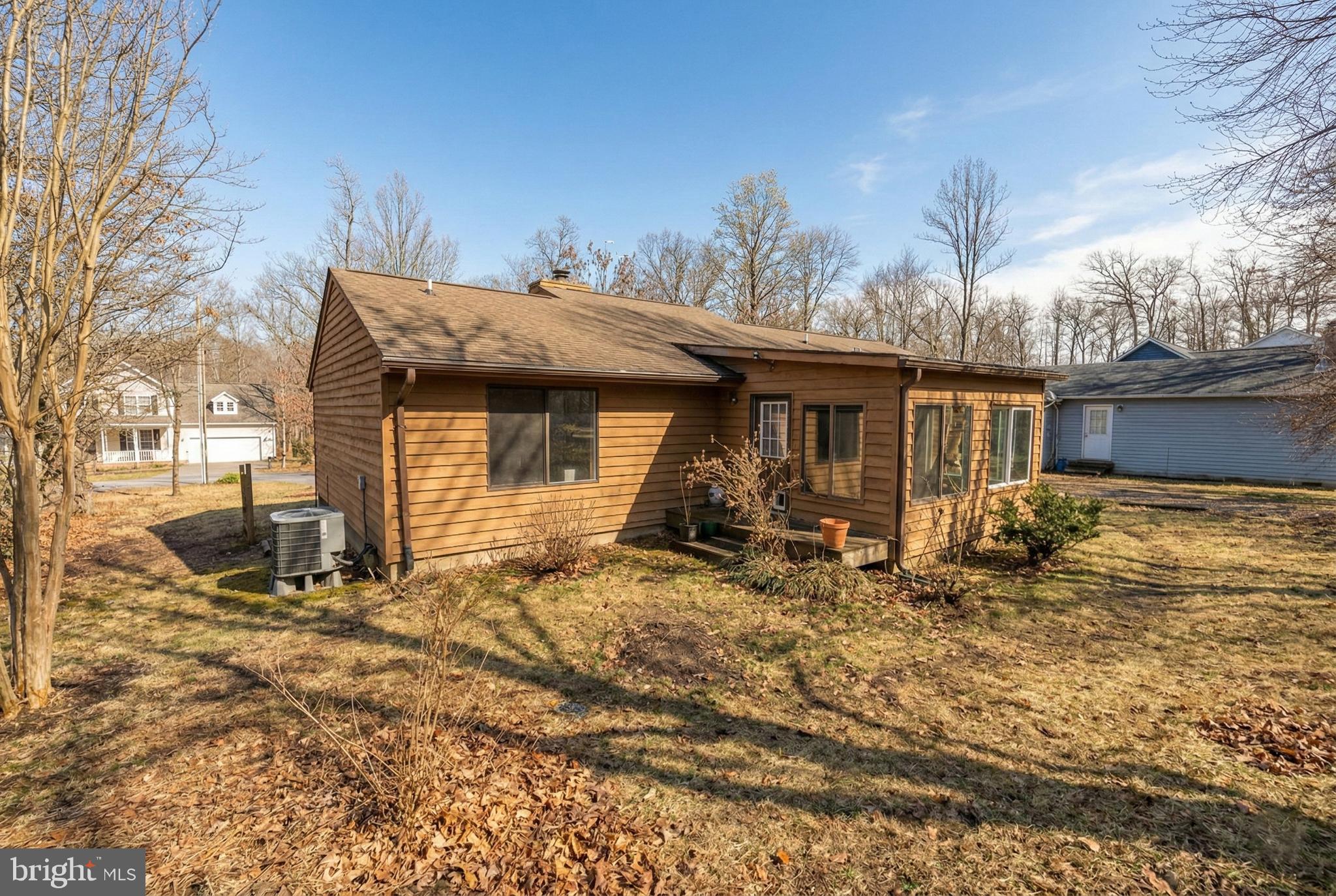 124 Saylers Creek Road Locust Grove, VA 22508 - Photo 39 of 55 a house with trees in the background