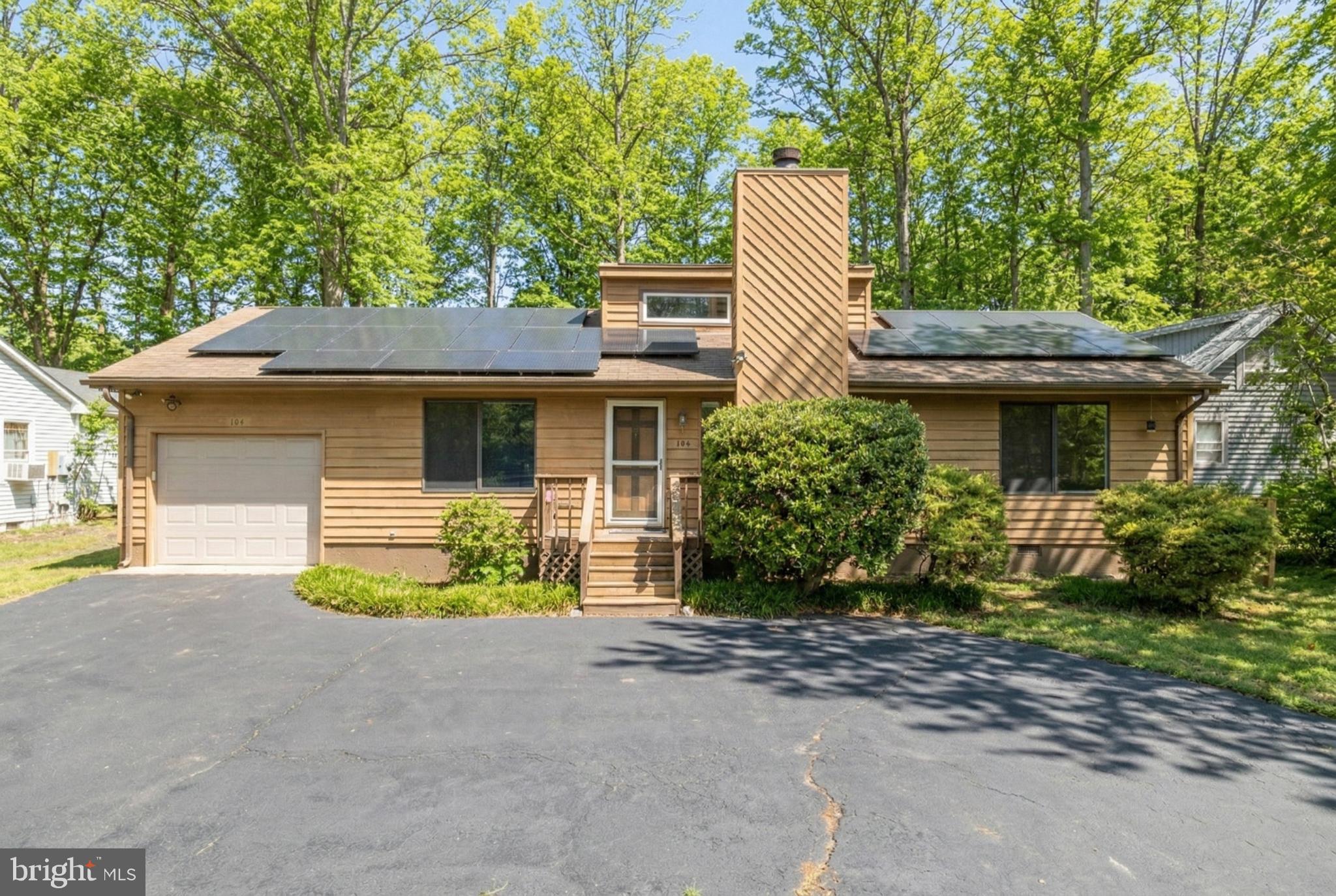 124 Saylers Creek Road Locust Grove, VA 22508 - Photo 40 of 55 a front view of a house with a garden and porch