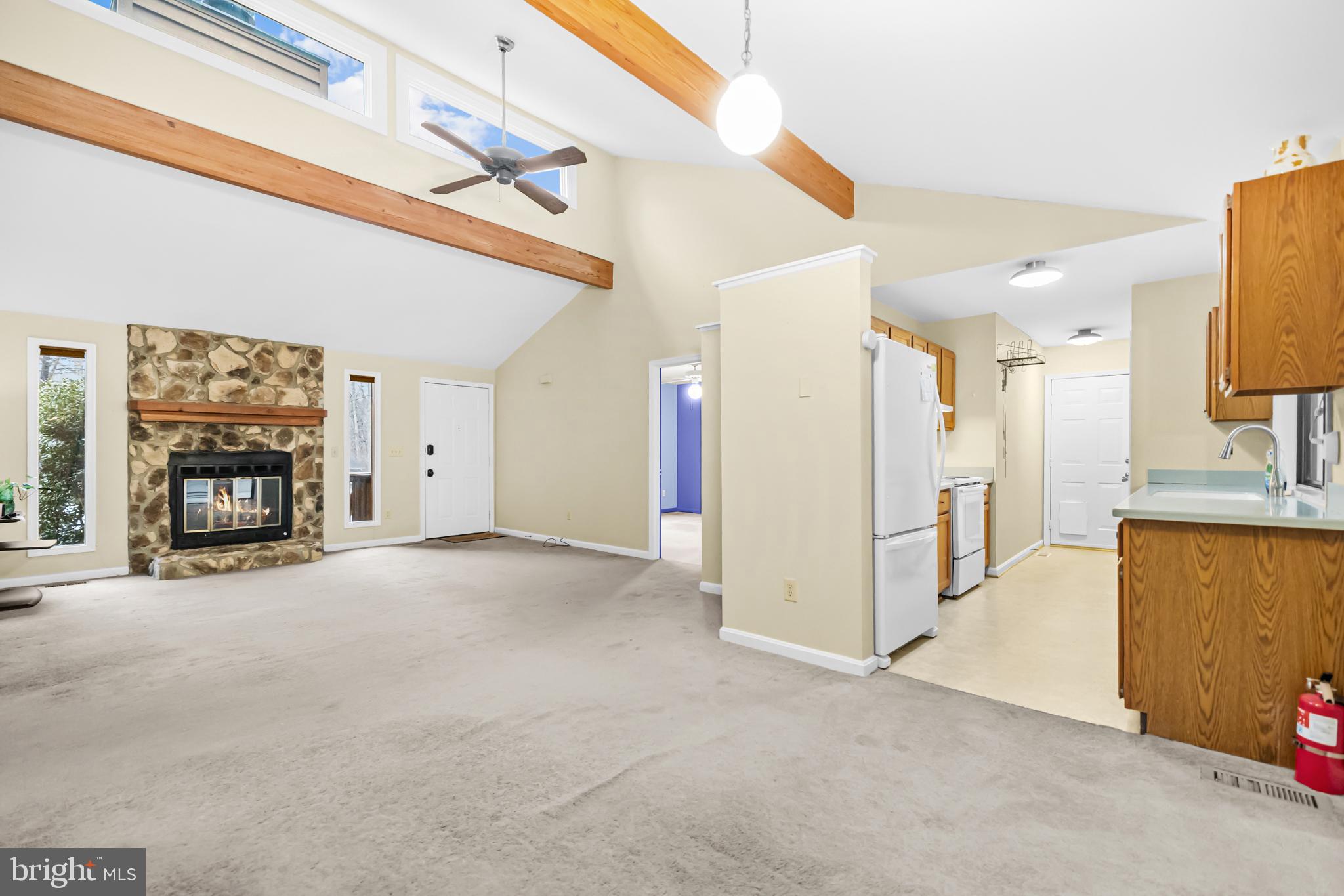 124 Saylers Creek Road Locust Grove, VA 22508 - Photo 9 of 55 a view of a livingroom with a fireplace and a window