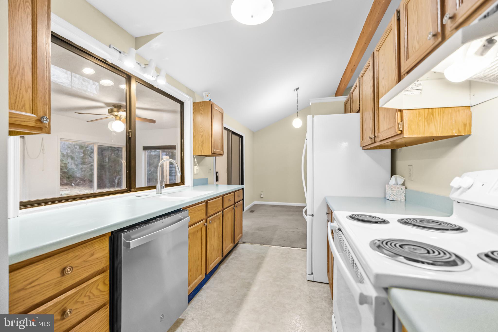 124 Saylers Creek Road Locust Grove, VA 22508 - Photo 10 of 55 a kitchen with a stove and a sink