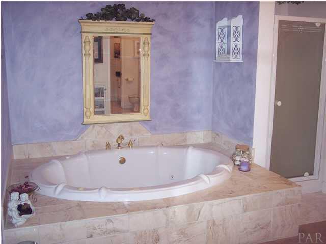 5816 Rutherford Road Pace, FL 32571 - Photo 14 of 24 Whirlpool tub with separate shower to your left.