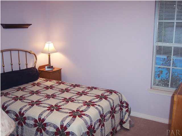 5816 Rutherford Road Pace, FL 32571 - Photo 17 of 24 Additional bedroom. This is a split plan.