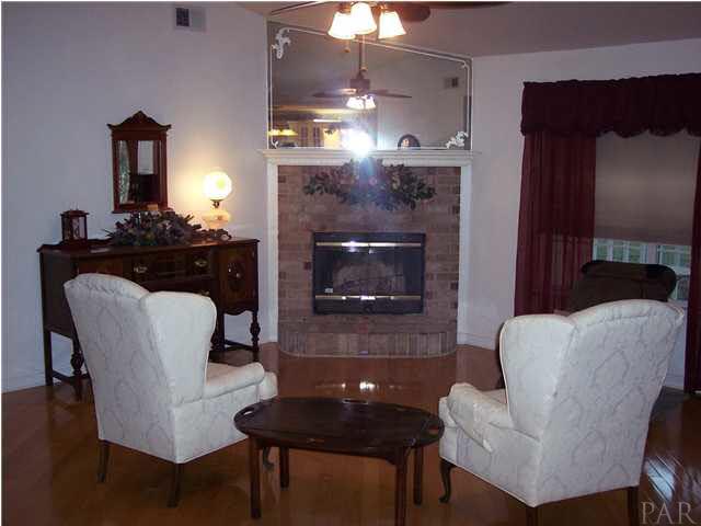 5816 Rutherford Road Pace, FL 32571 - Photo 2 of 24 View of formal living room from foyer.