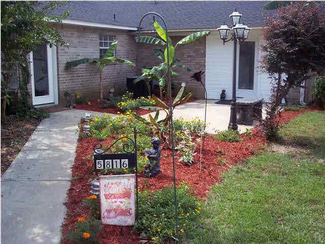 5816 Rutherford Road Pace, FL 32571 - Photo 22 of 24 View of 2nd patio on opposite side of home.