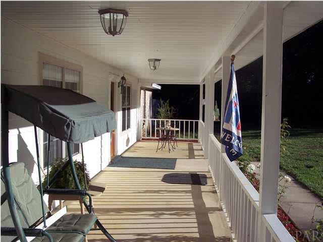 5816 Rutherford Road Pace, FL 32571 - Photo 23 of 24 View of large front porch from side yard.