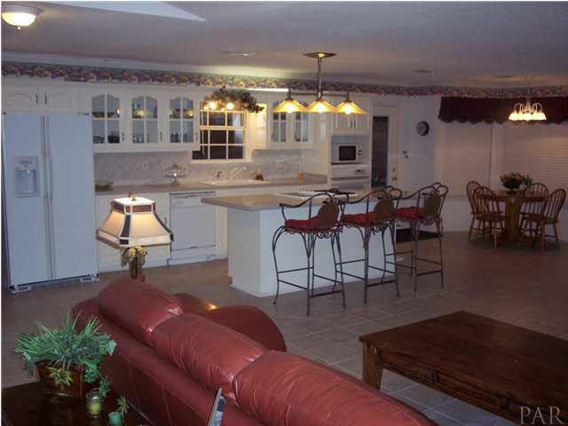 5816 Rutherford Road Pace, FL 32571 - Photo 5 of 24 View of kitchen from great room & breakfast nook to far right in pic.
