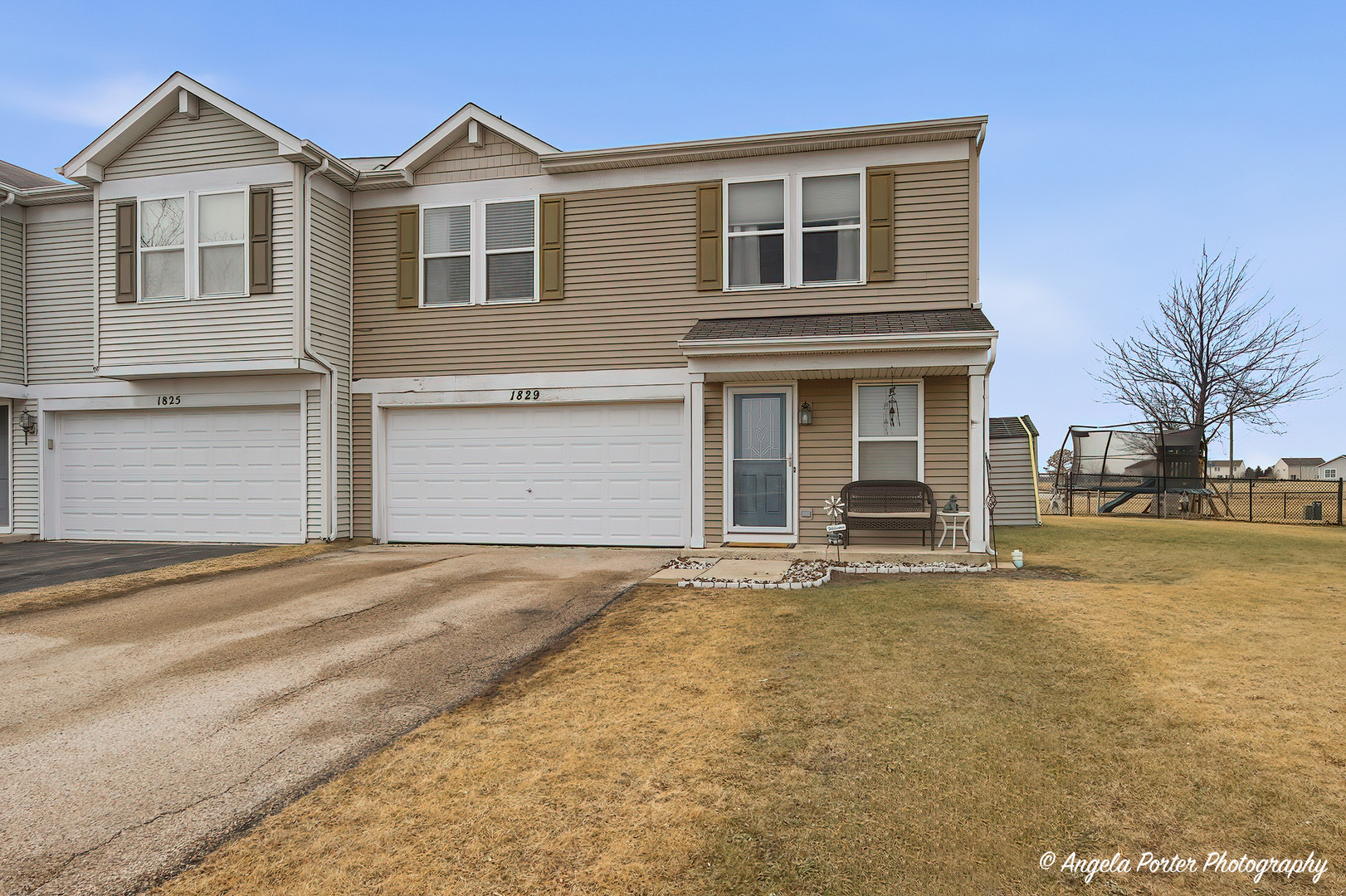 1829 Leatherleaf Trail Hebron, IL 60034 - Photo 1 of 1 a view of a house with a yard and large parking space