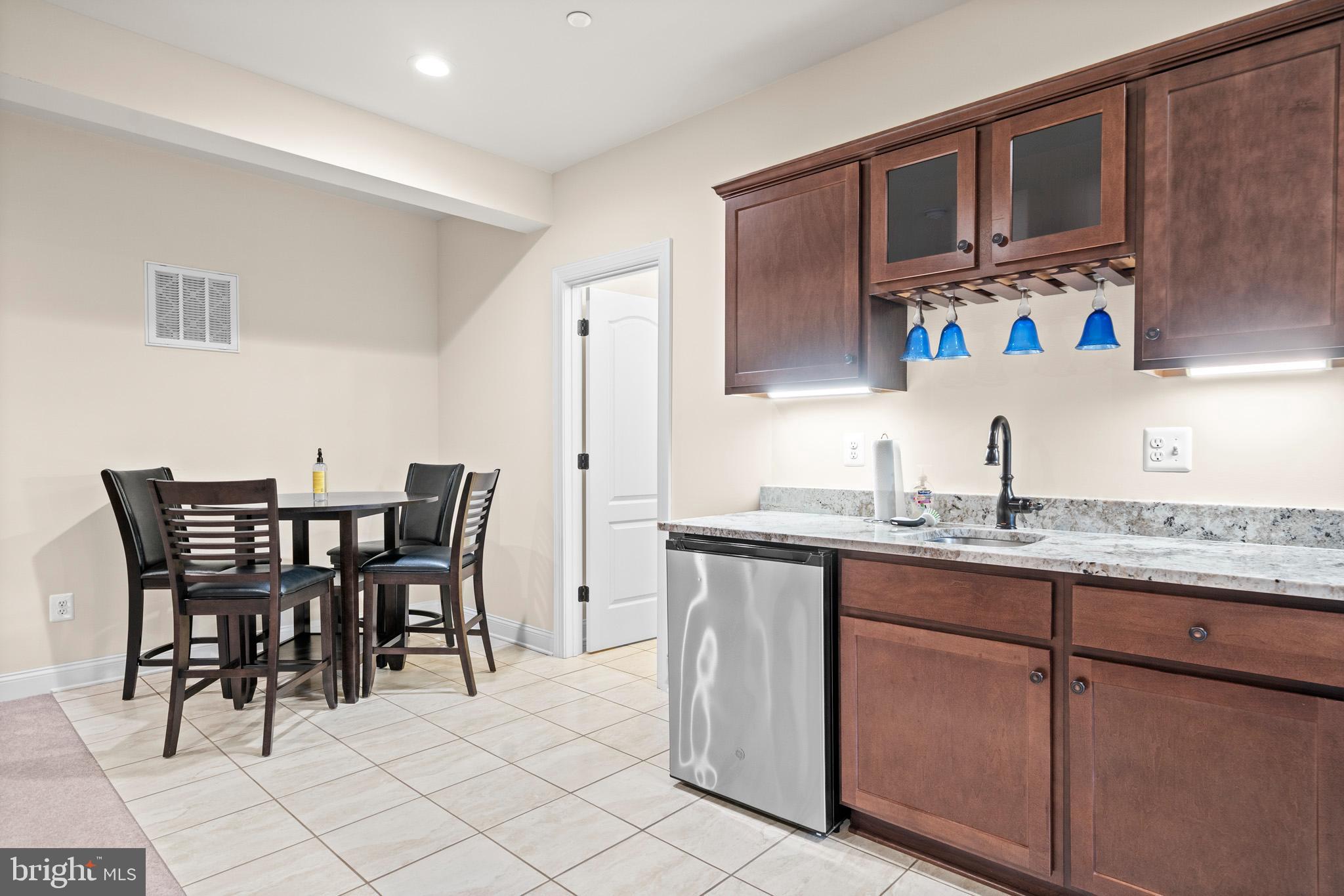 8175 Wheatley Road La Plata, MD 20646 - Photo 26 of 87 Wet bar and table area
