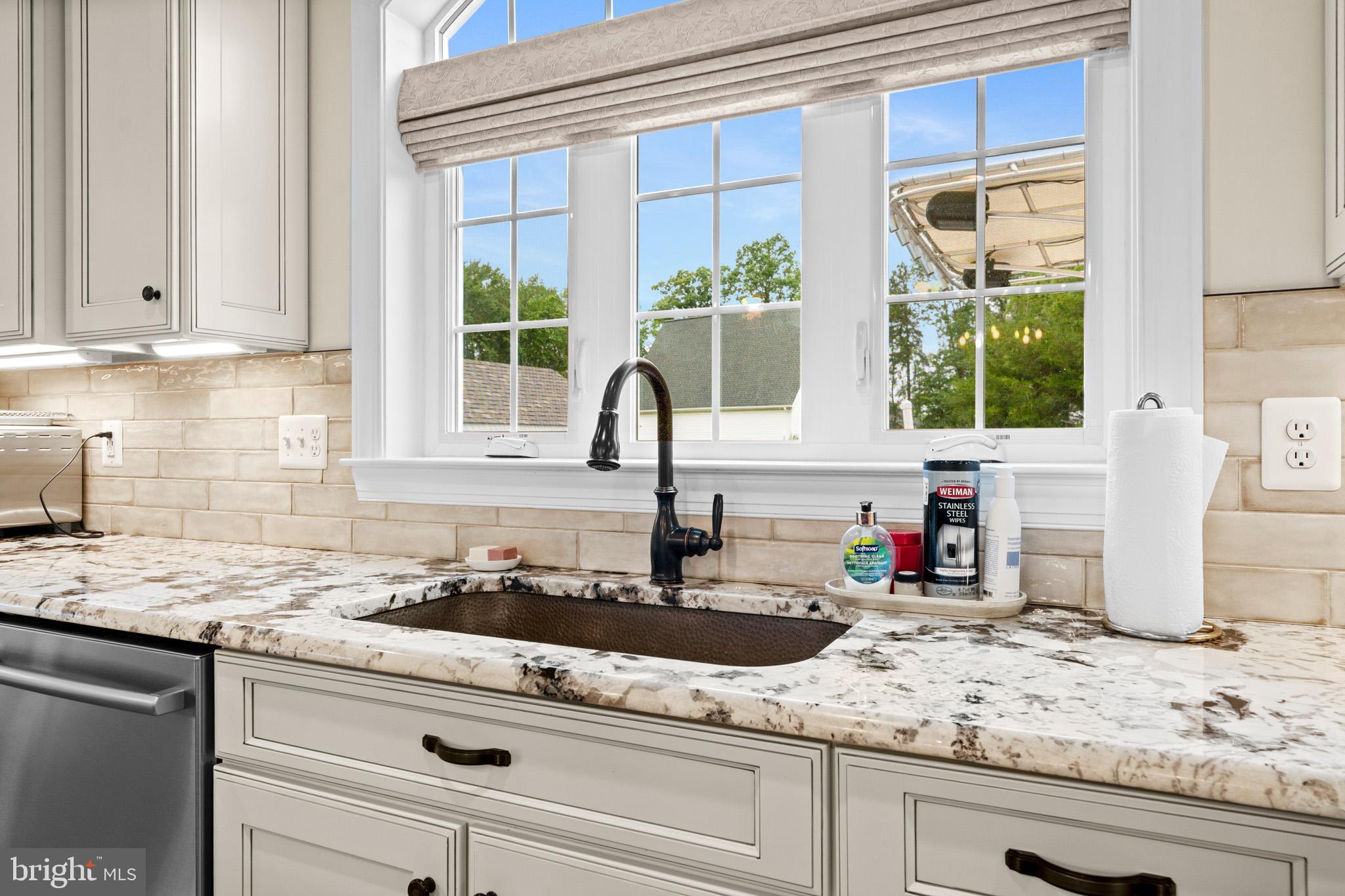 8175 Wheatley Road La Plata, MD 20646 - Photo 66 of 87 5' arch window over copper sink