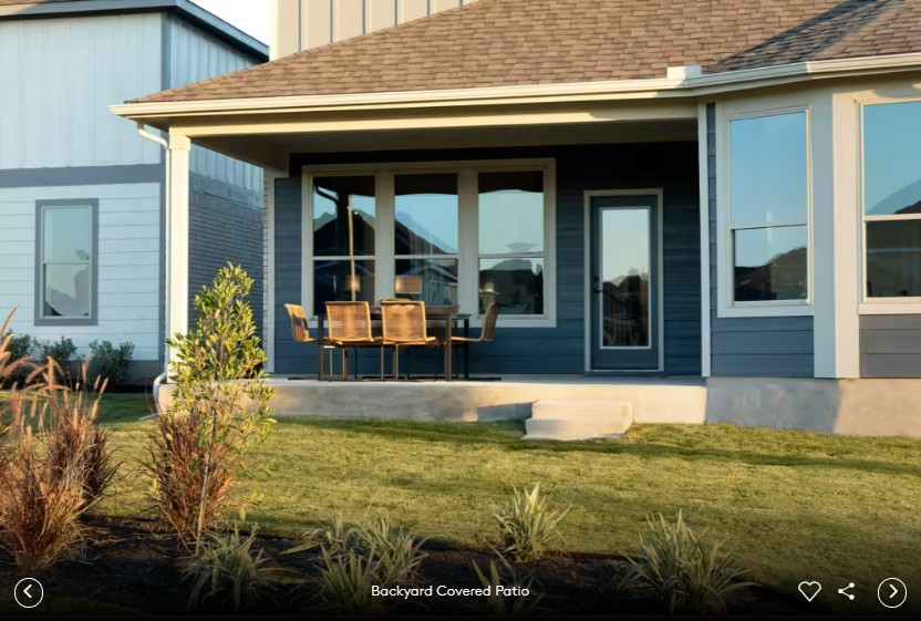167 Poinsettia Road Buda, TX 78610 - Photo 9 of 9 a view of a patio with table and chairs and potted plants