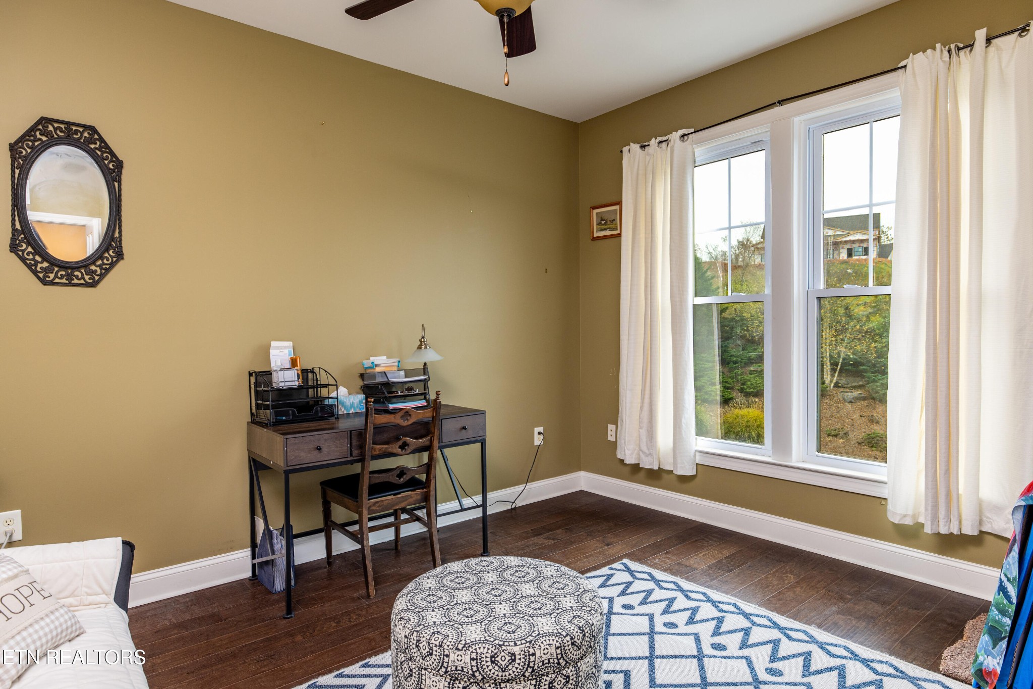 331 Centennial Bluff Boulevard Oak Ridge, TN 37830 - Photo 11 of 12 a view of a livingroom with furniture and a window