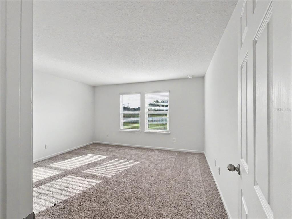 55 Signet Circle Flagler Beach, FL 32136 - Photo 4 of 39 a view of a room that has a window in it