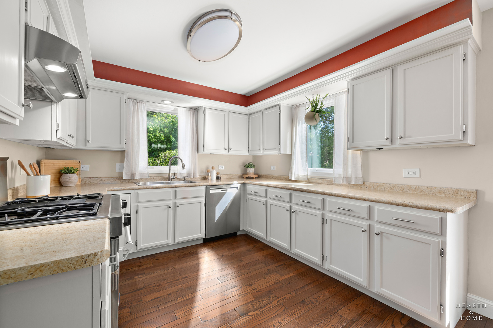 41 Manchester Court Fox River Grove, IL 60021 - Photo 12 of 57 a kitchen with cabinets oven and a window