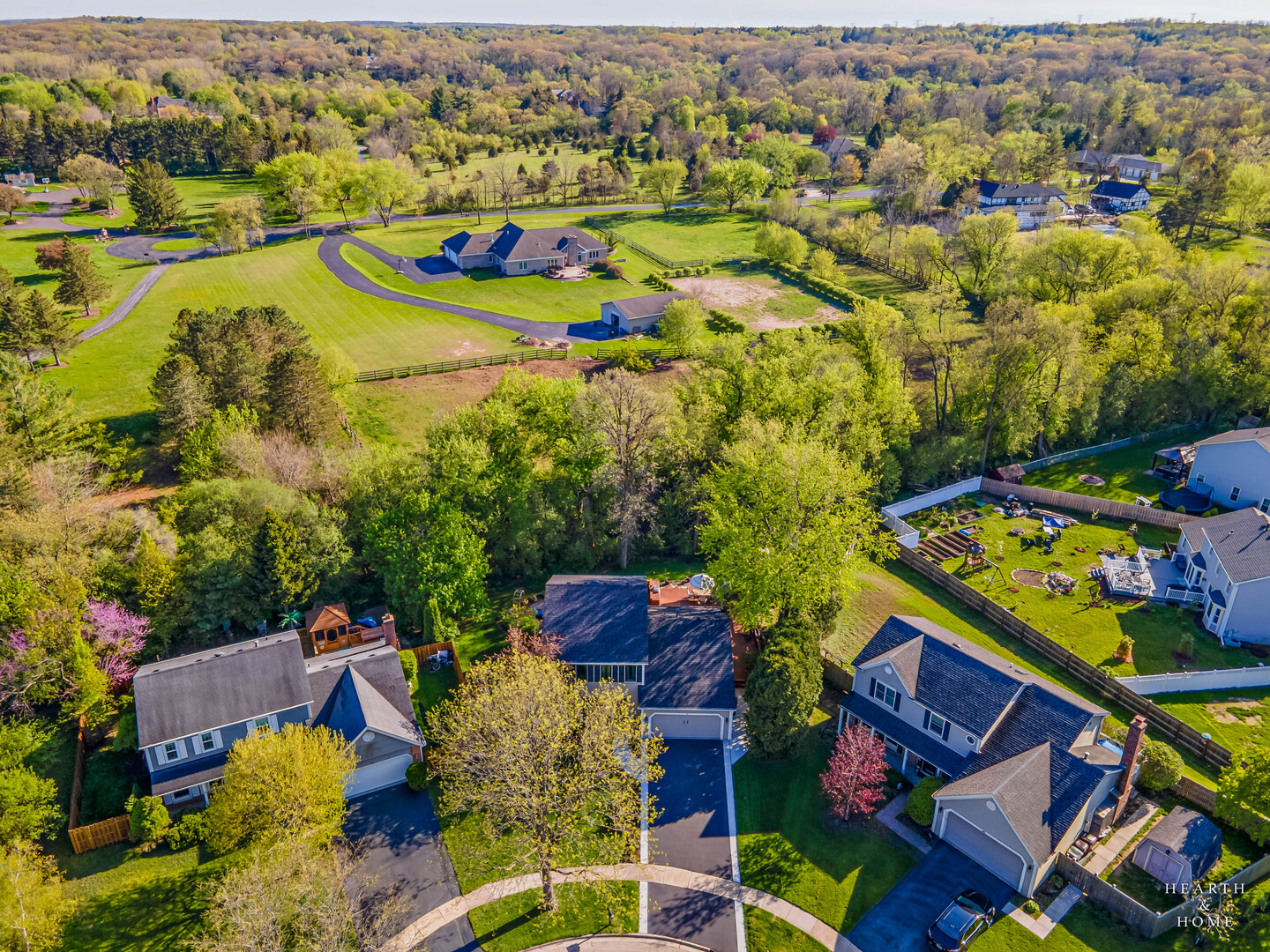 41 Manchester Court Fox River Grove, IL 60021 - Photo 38 of 57 an aerial view of residential houses with outdoor space and swimming pool
