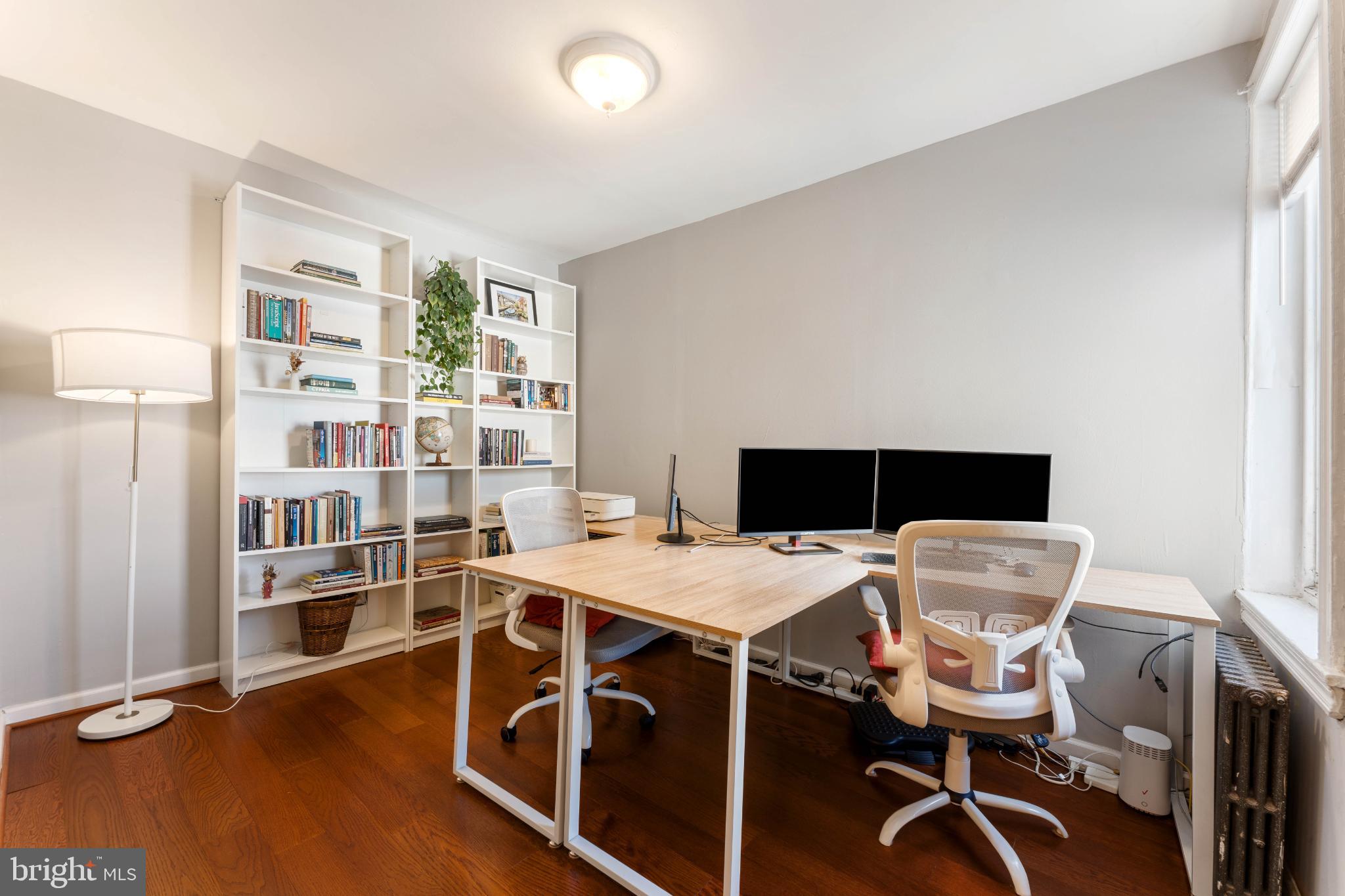 134 Davis Street Philadelphia, PA 19127 - Photo 23 of 33 a room with a table chairs and workspace