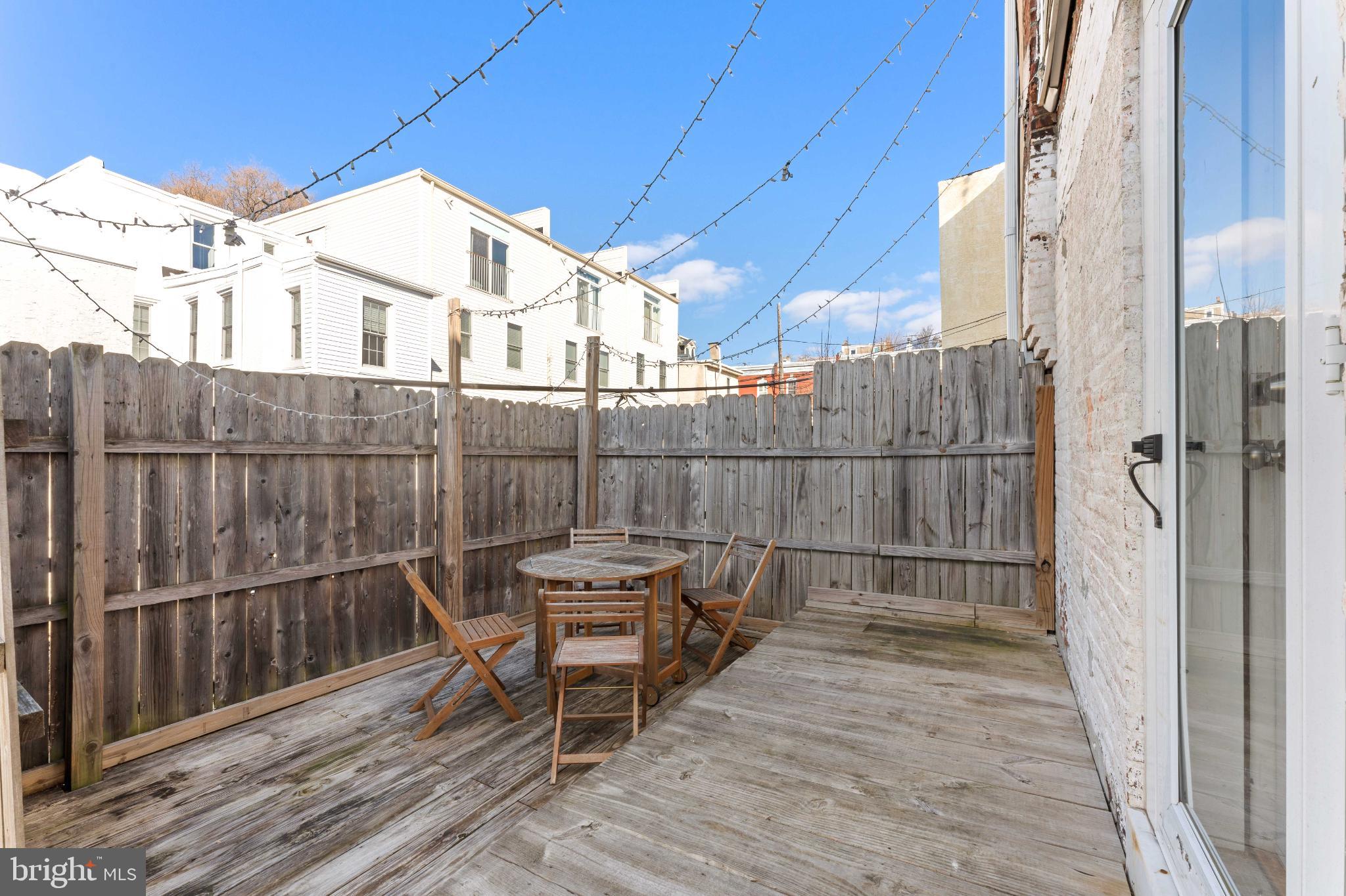 134 Davis Street Philadelphia, PA 19127 - Photo 31 of 33 a view of a roof deck with wooden floor and seating space