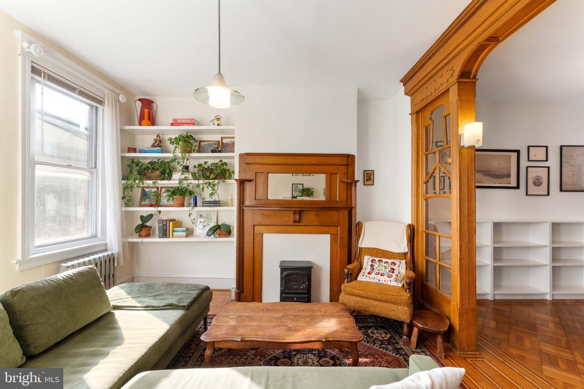 134 Davis Street Philadelphia, PA 19127 - Photo 9 of 33 a living room with furniture fireplace and flat screen tv