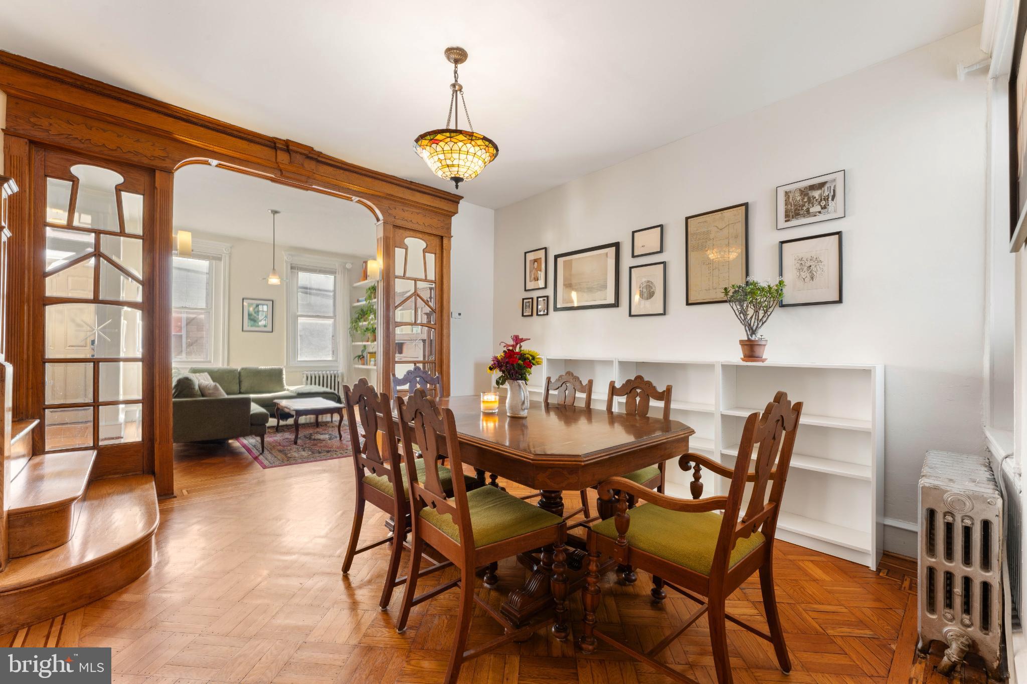 134 Davis Street Philadelphia, PA 19127 - Photo 10 of 33 a view of a dining room with furniture and a chandelier