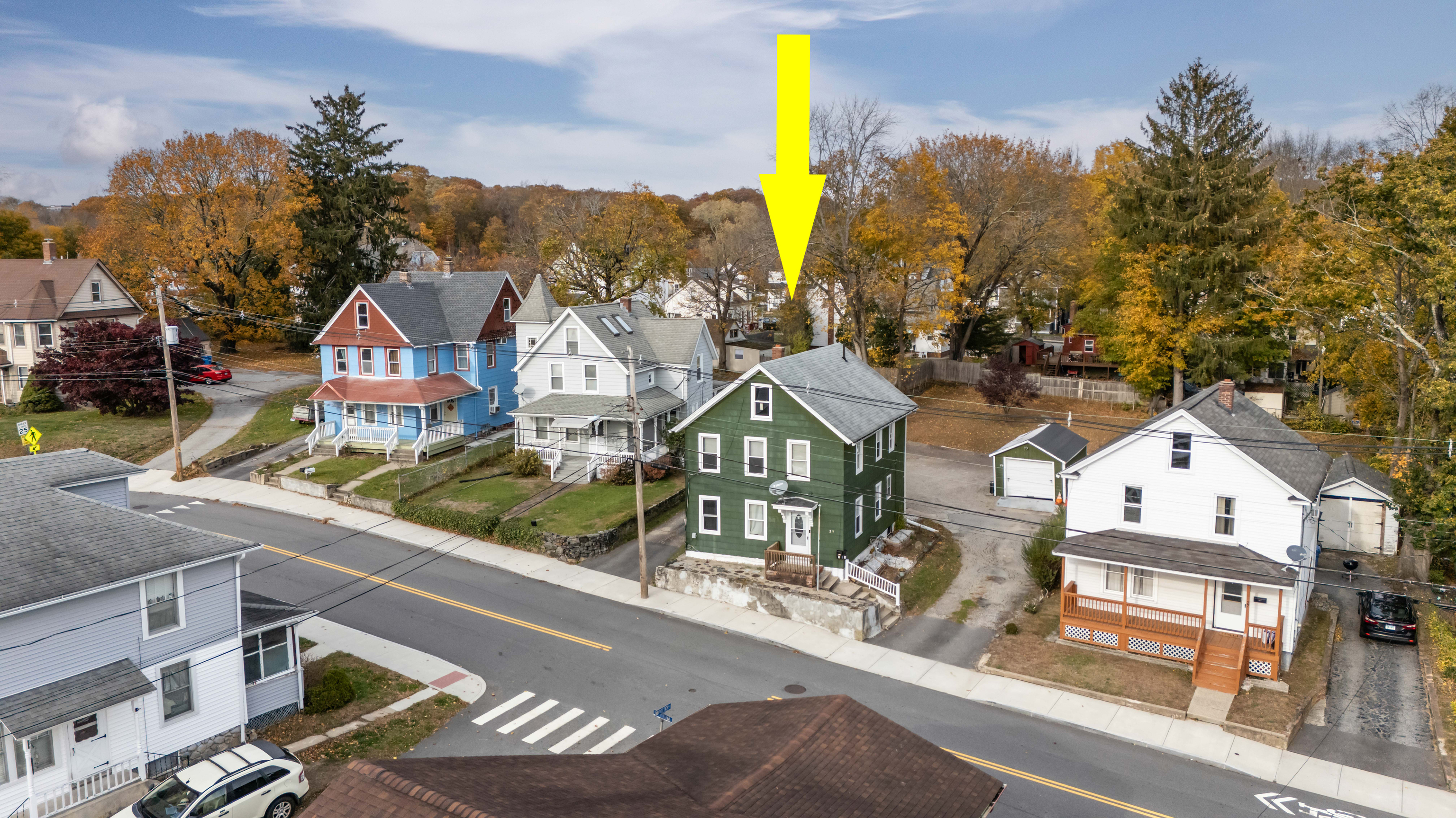 29 Dunham Street Norwich, CT 06360 - Photo 1 of 33 a view of multiple houses with a street