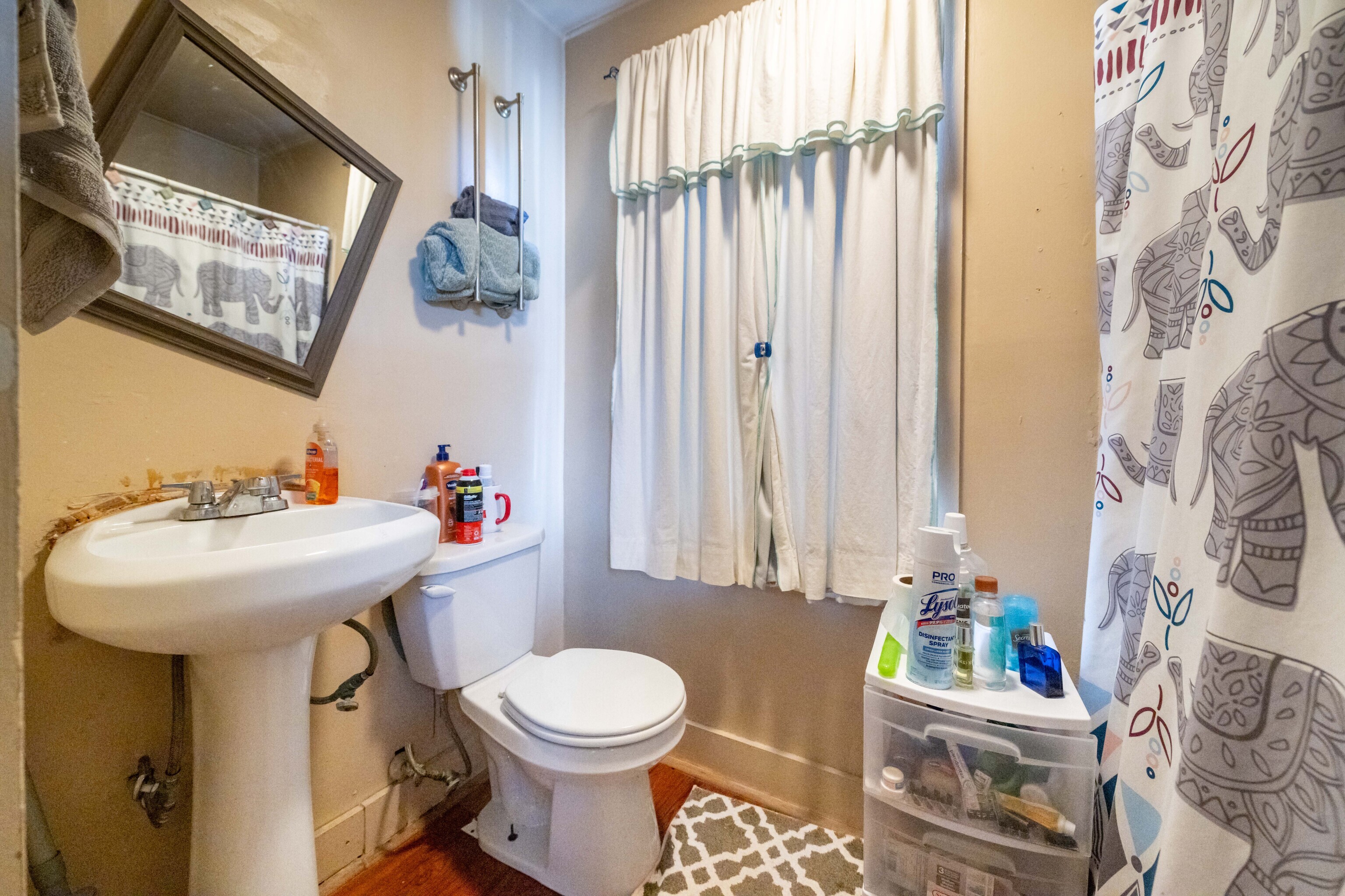 29 Dunham Street Norwich, CT 06360 - Photo 24 of 33 a bathroom with a sink toilet and shower