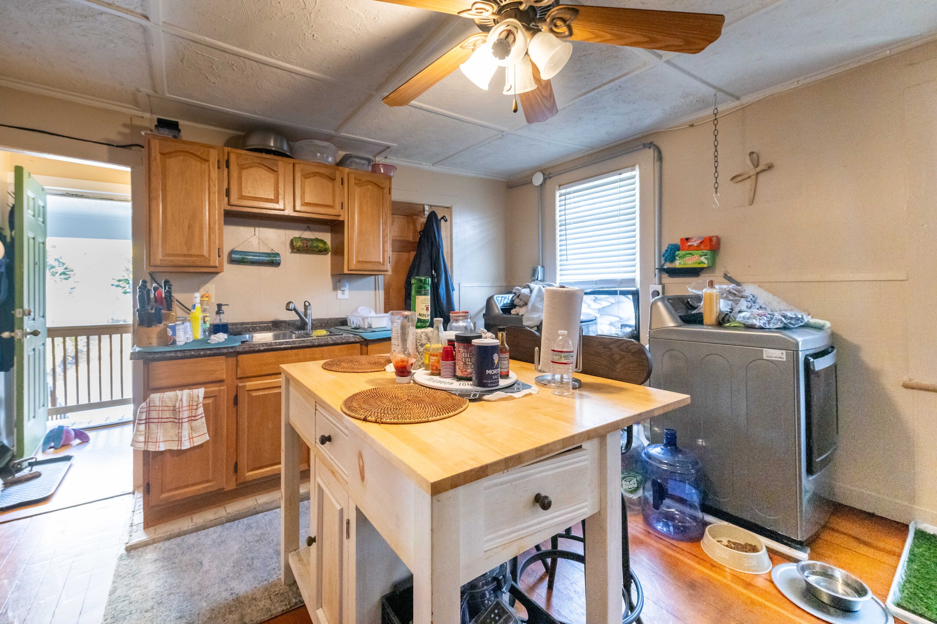 29 Dunham Street Norwich, CT 06360 - Photo 28 of 33 a kitchen with stainless steel appliances granite countertop a sink stove and refrigerator