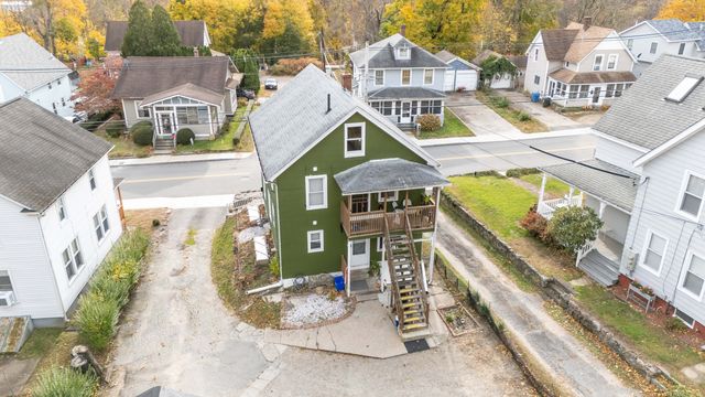 an aerial view of a house with a garden
