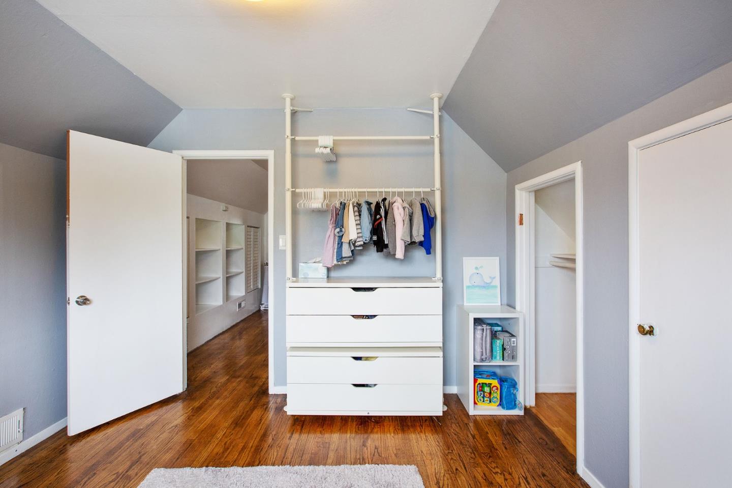 412 Lomond Drive Pacifica, CA 94044 - Photo 17 of 26 a view of room with wooden floor