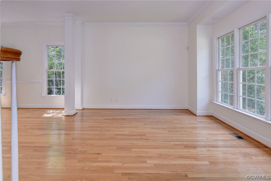 5531 Scotsview Drive Providence Forge, VA 23140 - Photo 18 of 42 a view of an empty room with wooden floor and a window