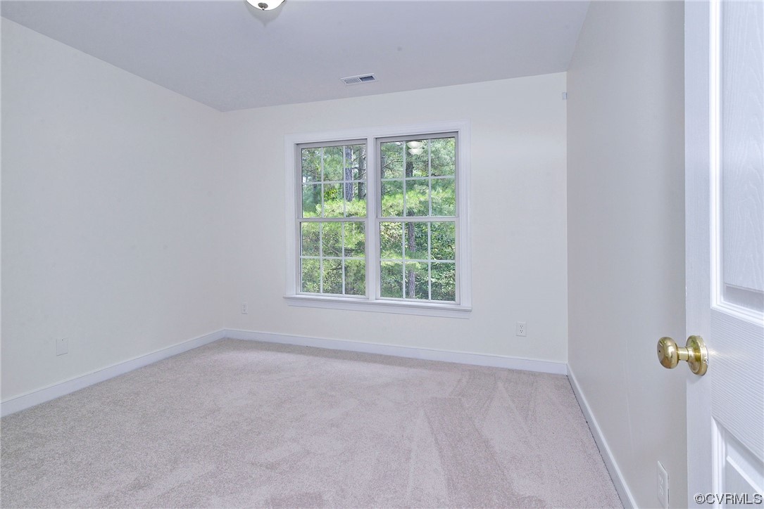 5531 Scotsview Drive Providence Forge, VA 23140 - Photo 31 of 42 an empty room with windows