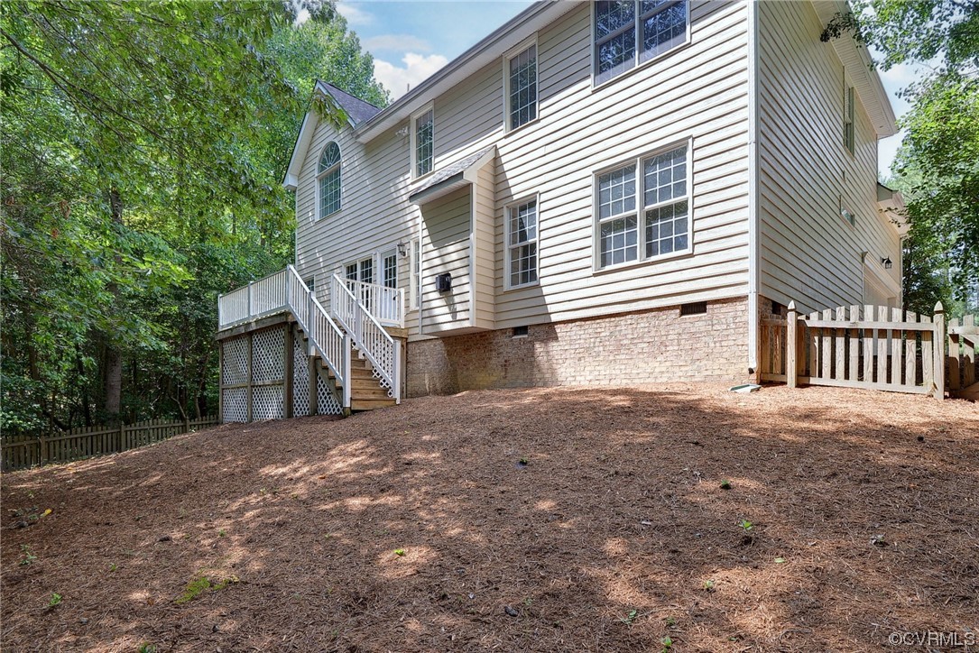 5531 Scotsview Drive Providence Forge, VA 23140 - Photo 39 of 42 a front view of a house with a yard and garage
