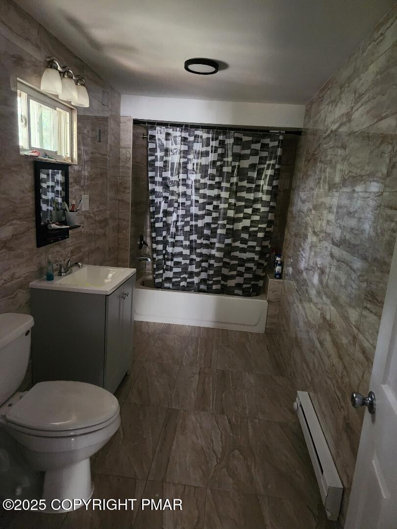 22 Mountain Top Road East Stroudsburg, PA 18302 - Photo 9 of 9 a bathroom with a granite countertop toilet a sink and a mirror