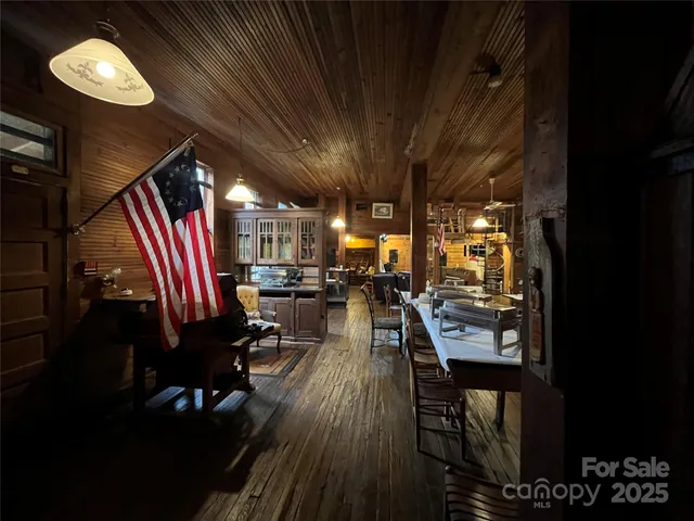 a view of a workspace with furniture