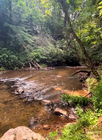 a view of a lake with beach
