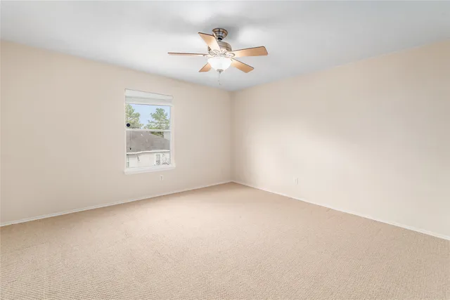 a bathroom with a sink toilet and mirror