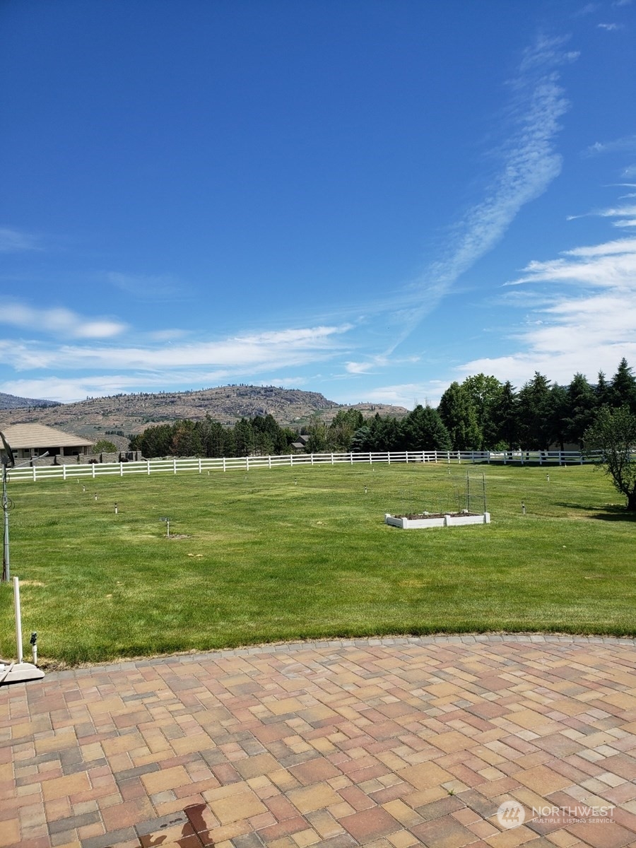 86 Engh Road Omak, WA 98841 - Photo 3 of 40 a view of a lake with a big yard