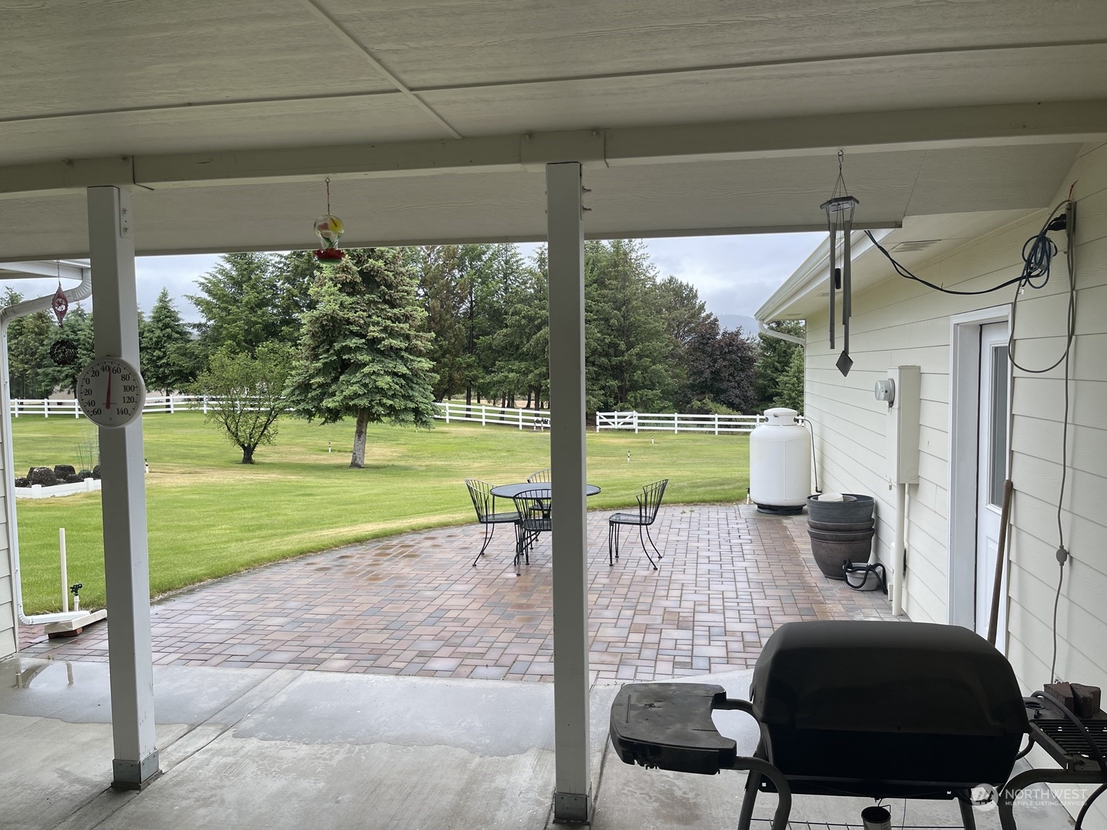 86 Engh Road Omak, WA 98841 - Photo 37 of 40 a view of a porch with furniture and a yard