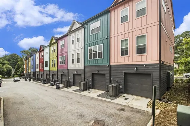 a street corner with building in the background