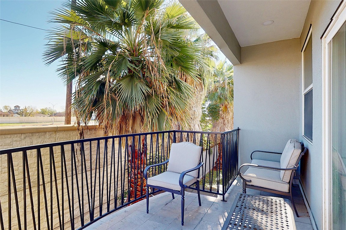 2023 Rosedale Street Houston, TX 77004 - Photo 26 of 30 a view of a balcony with furniture