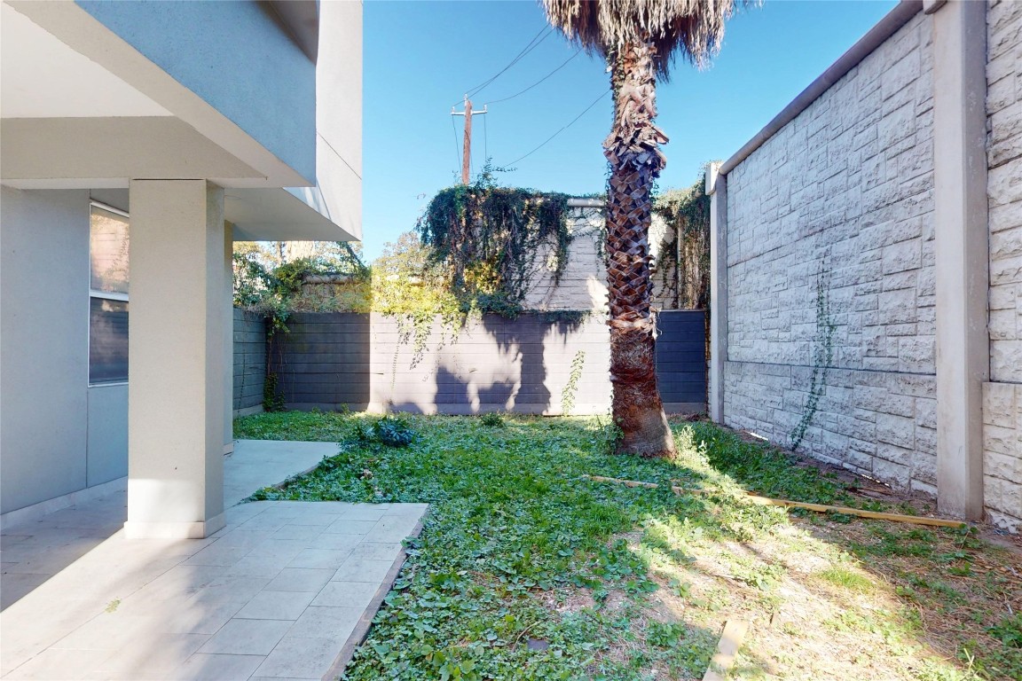 2023 Rosedale Street Houston, TX 77004 - Photo 27 of 30 a front view of a house with garden