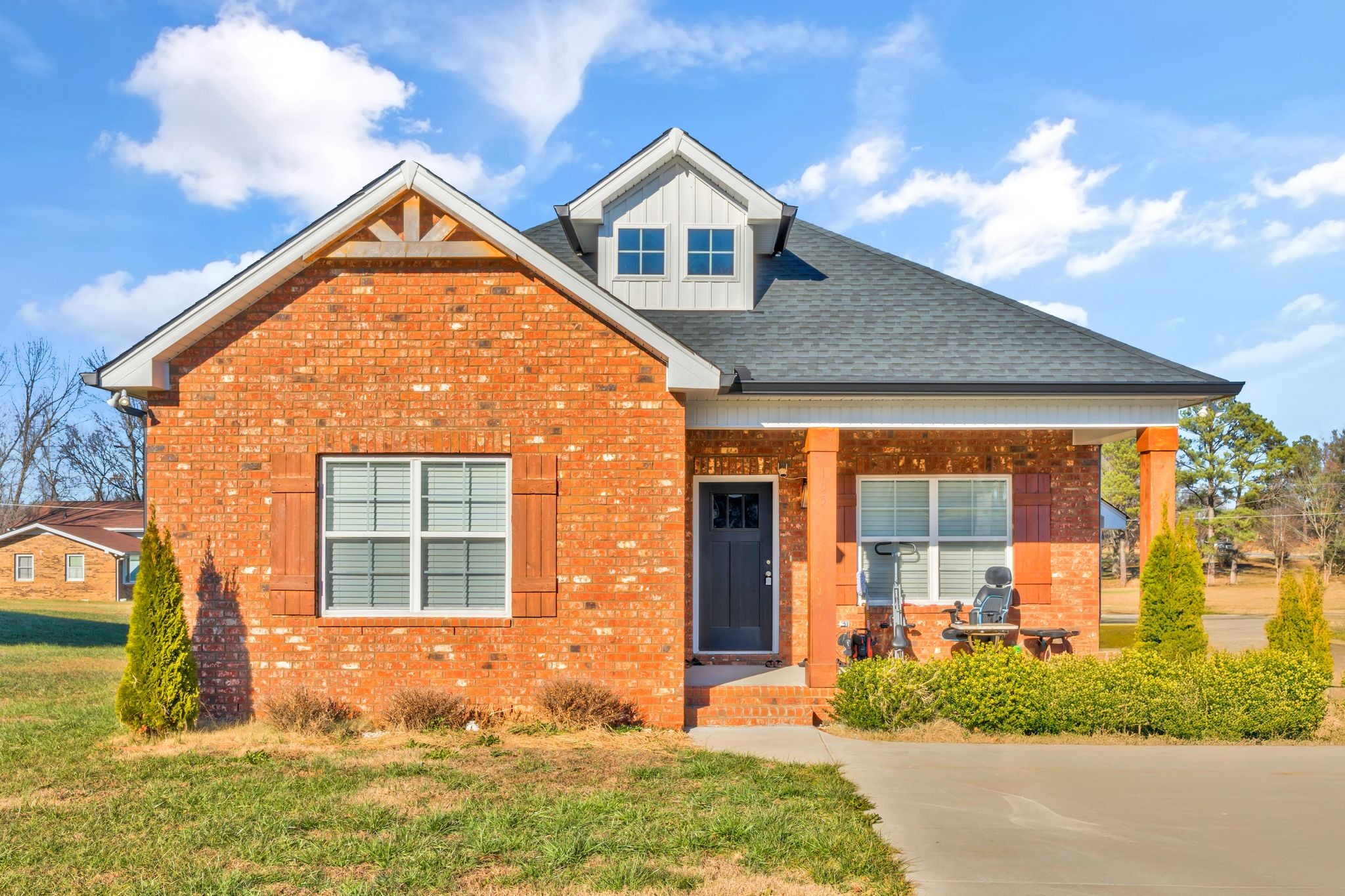 front view of a house with a yard