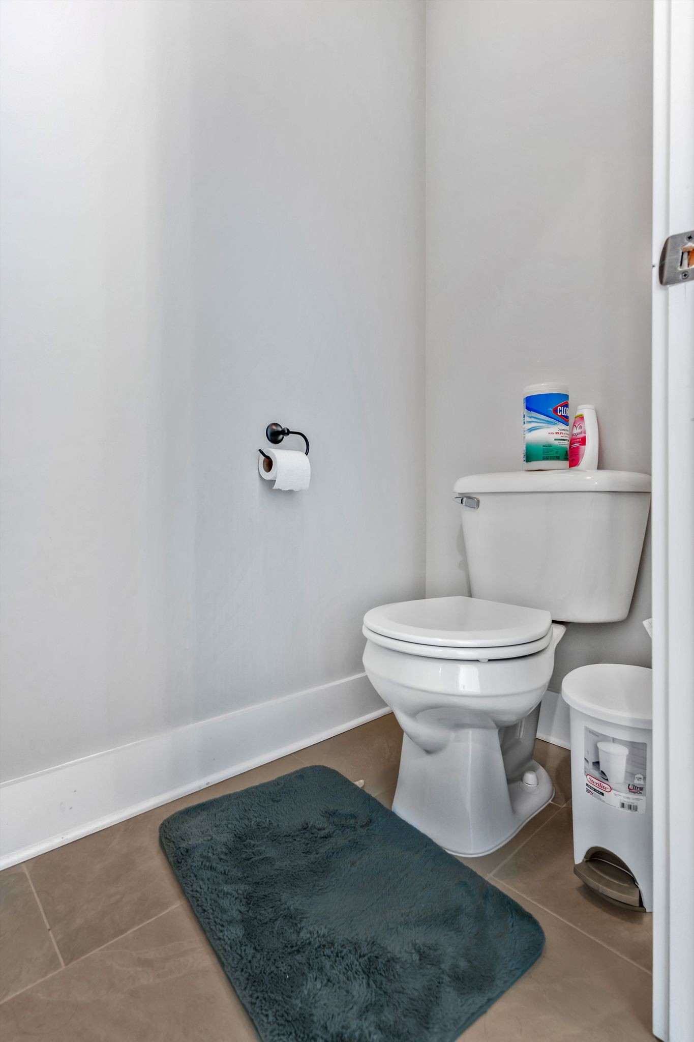 155 Julia Ann Court Springfield, TN 37172 - Photo 14 of 24 a white toilet sitting next to a white cabinet