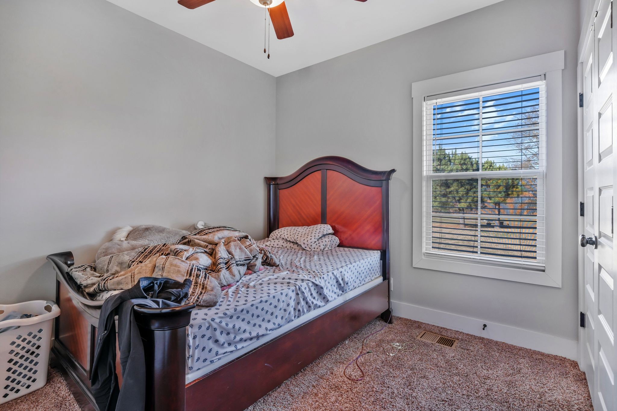 155 Julia Ann Court Springfield, TN 37172 - Photo 18 of 24 a bedroom with bed and a window