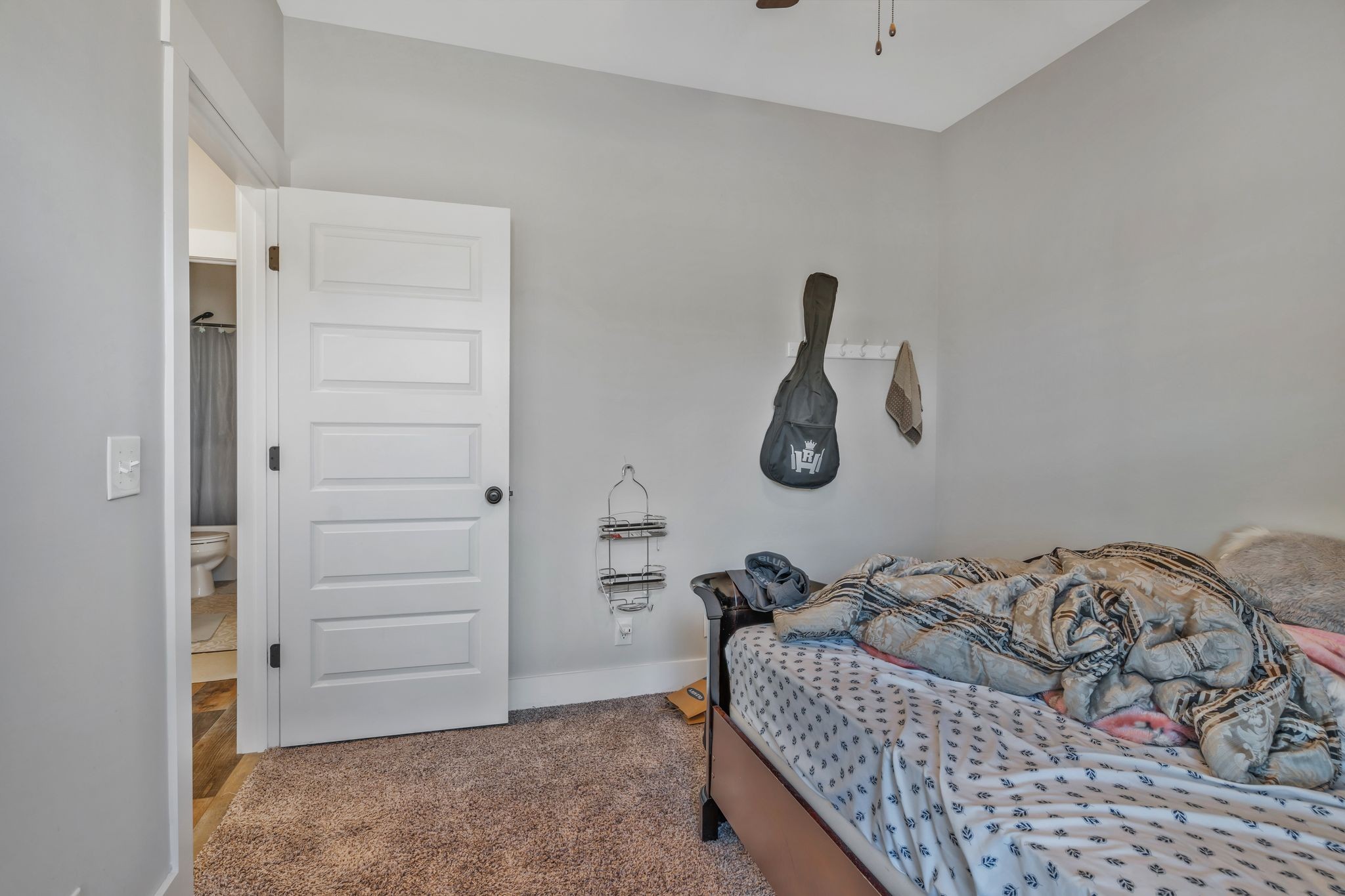 155 Julia Ann Court Springfield, TN 37172 - Photo 19 of 24 a bedroom with a bed and cabinet