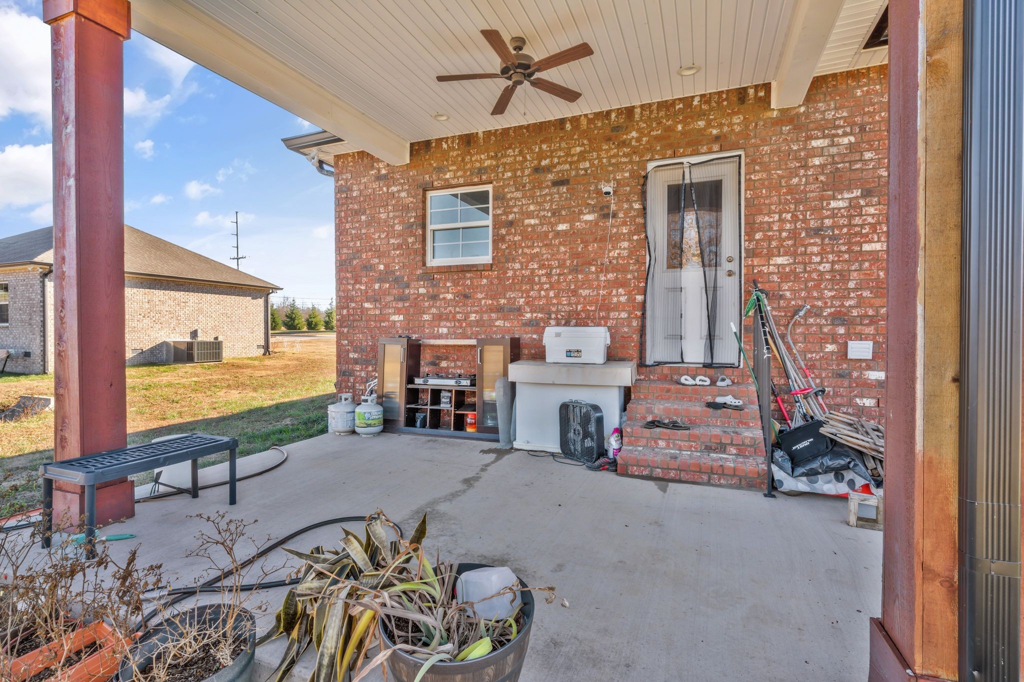 155 Julia Ann Court Springfield, TN 37172 - Photo 22 of 24 a balcony with furniture and a floor to ceiling window