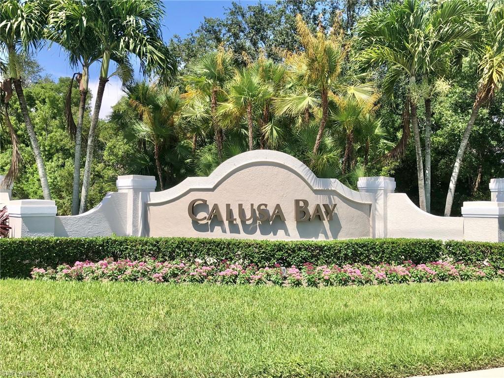 6879 Redbay Park Road, Unit 203 Naples, FL 34109 - Photo 20 of 34 a view of a back yard