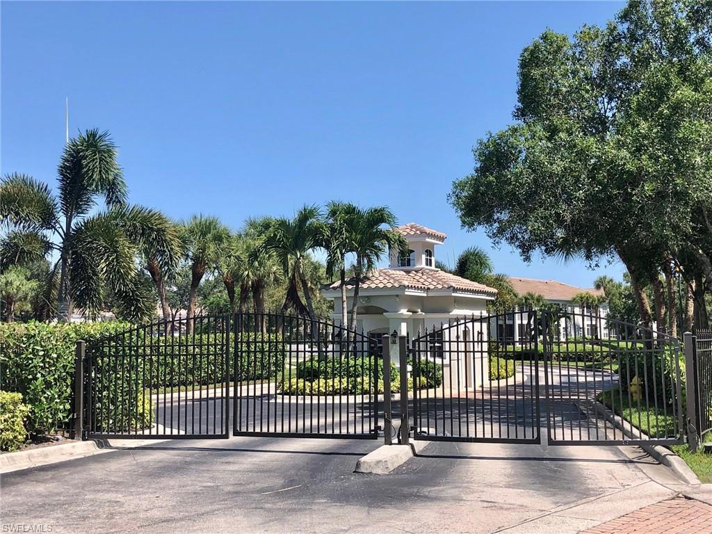 6879 Redbay Park Road, Unit 203 Naples, FL 34109 - Photo 21 of 34 a view of a street from a balcony