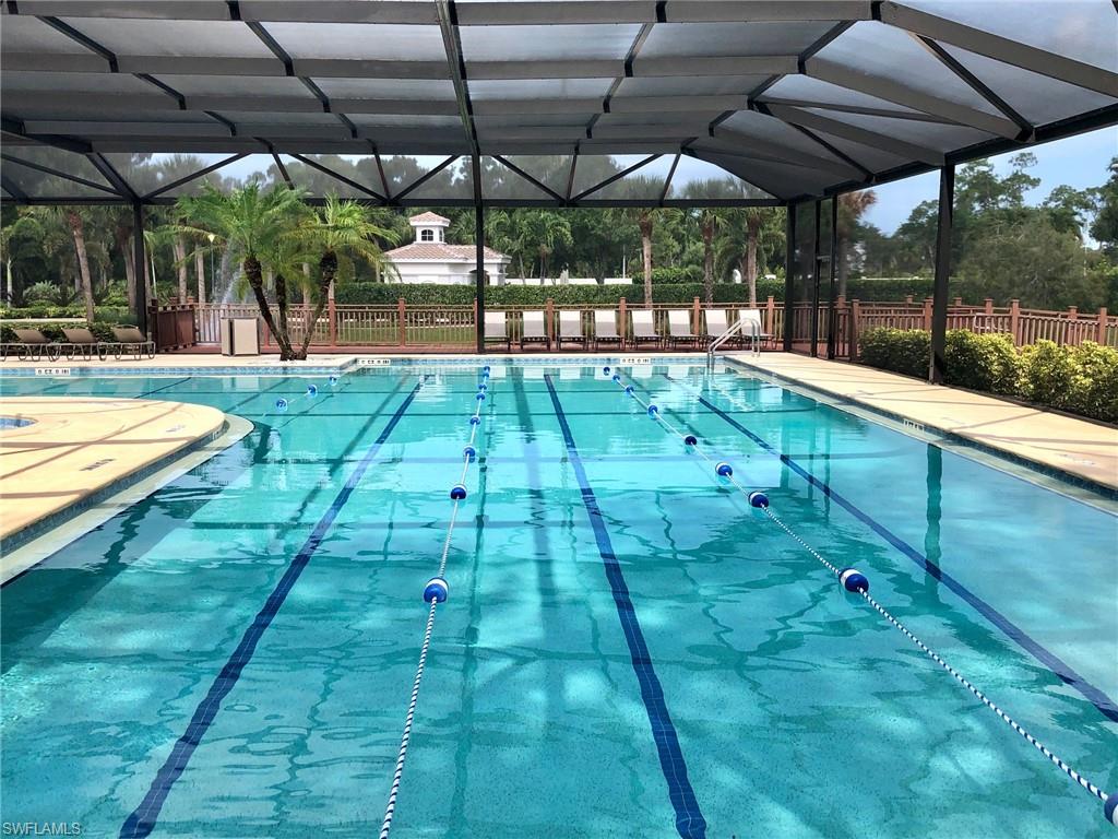 6879 Redbay Park Road, Unit 203 Naples, FL 34109 - Photo 31 of 34 a view of yard with a patio